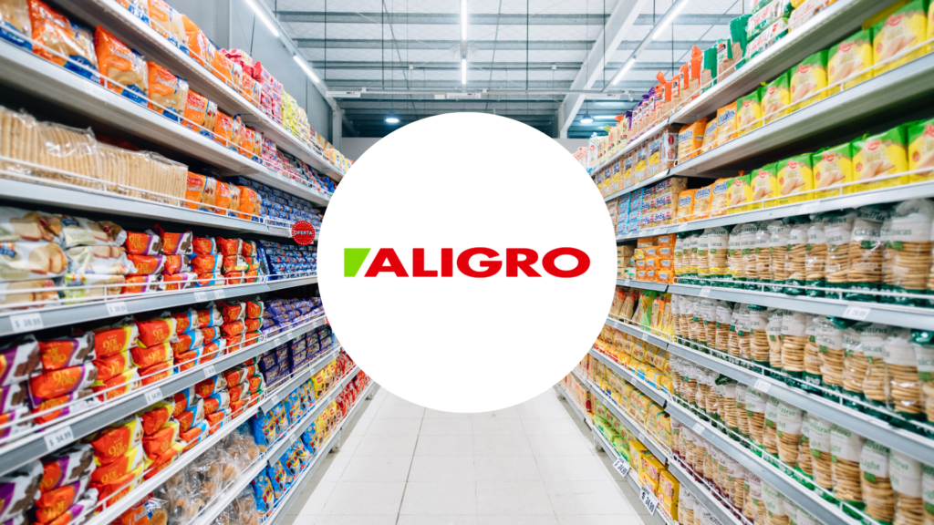 Logo Aligro sur un fond d'un rayon de supermarché